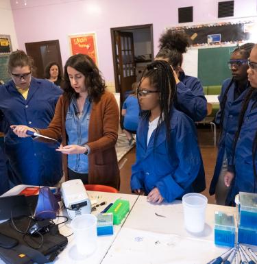 students and instructor during a session of the biotechnology curriculum